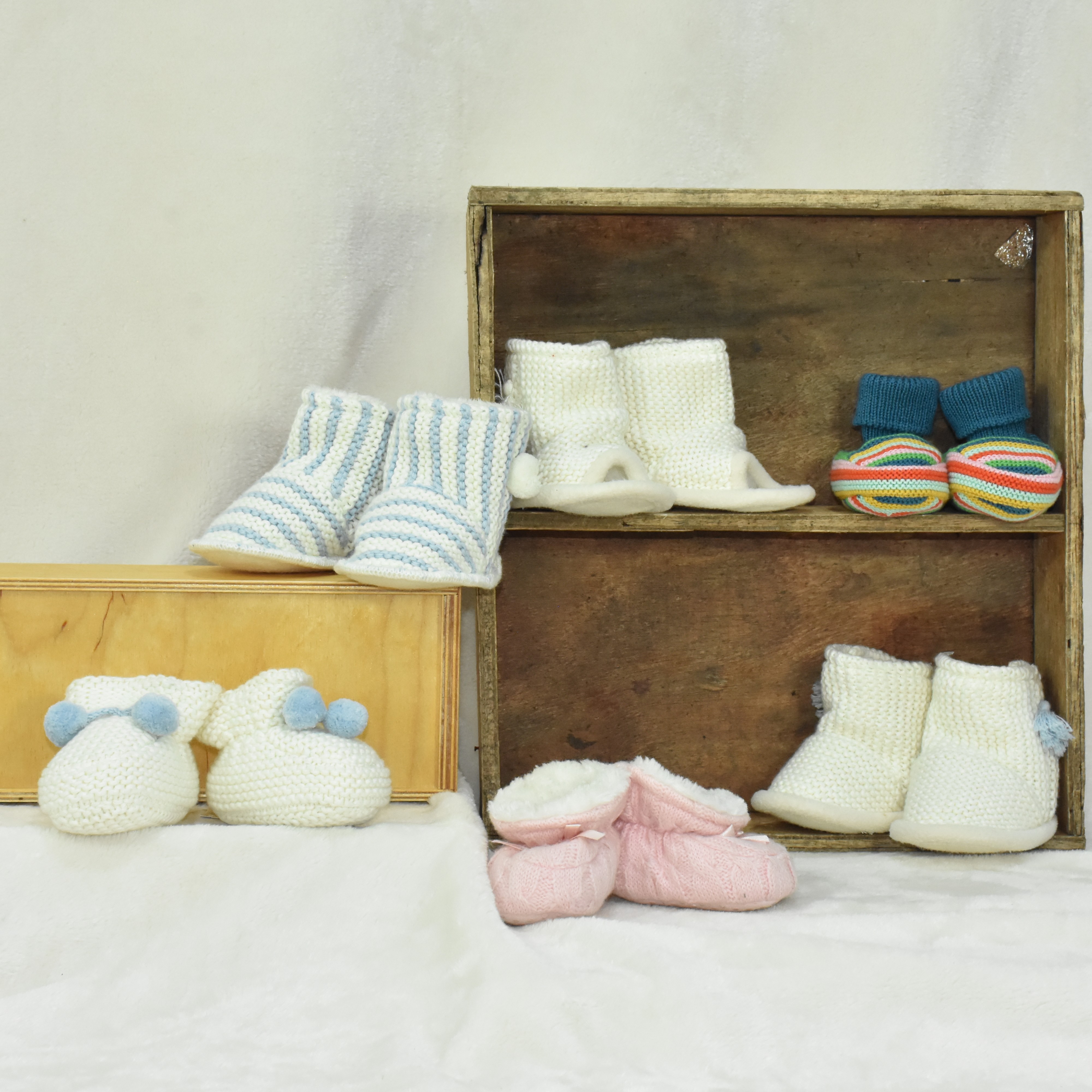 Knitted baby booties and accessories